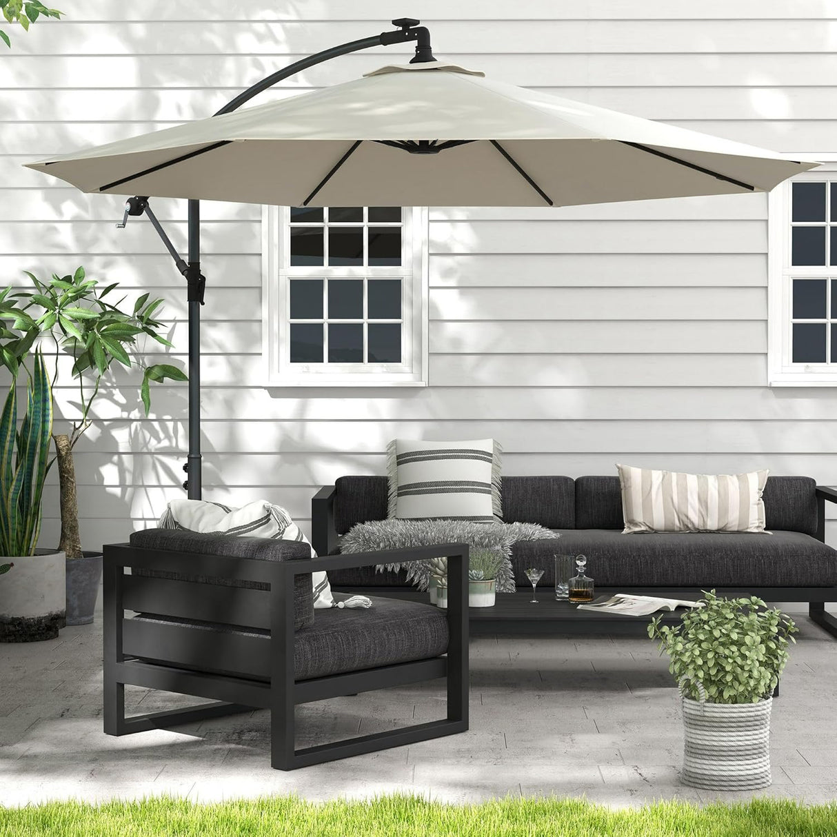 Patioslife cream cantilever parasol shading outdoor sofa and patio furniture in a garden seating area