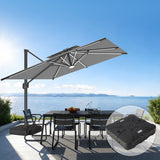 Patioslife grey cantilever parasol with weighted base over outdoor dining set by sea view