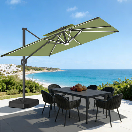 Patioslife sage green cantilever parasol with LED lights over garden dining set by the coast
